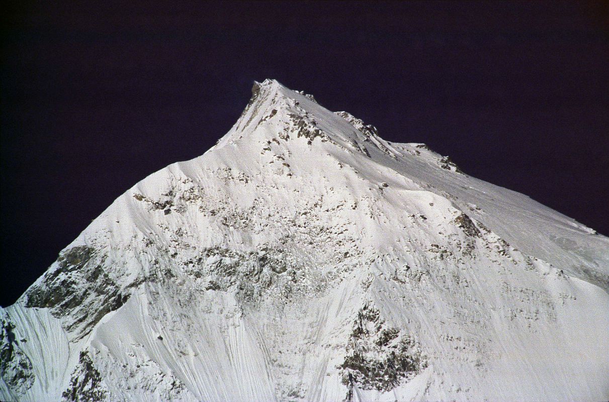 205 Dhaulagiri Northeast Face Close Up From Before Tukuche �Then there was the north ridge; it was undoubtedly ice, but, judging from the moderate angle and slight rise in height would make it very suitable for an attempt� (Maurice Herzog, Annapurna). How right he was. The normal climbing route used on the first ascent goes from right to left up the northeast ridge to the summit ridge and then across to the summit.